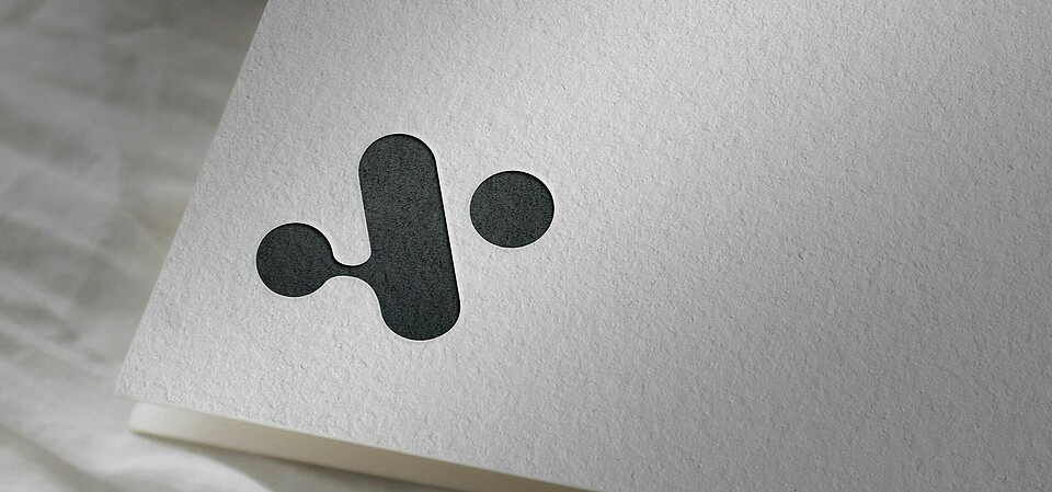 Aiomics Logo Aiomics Logo on paper